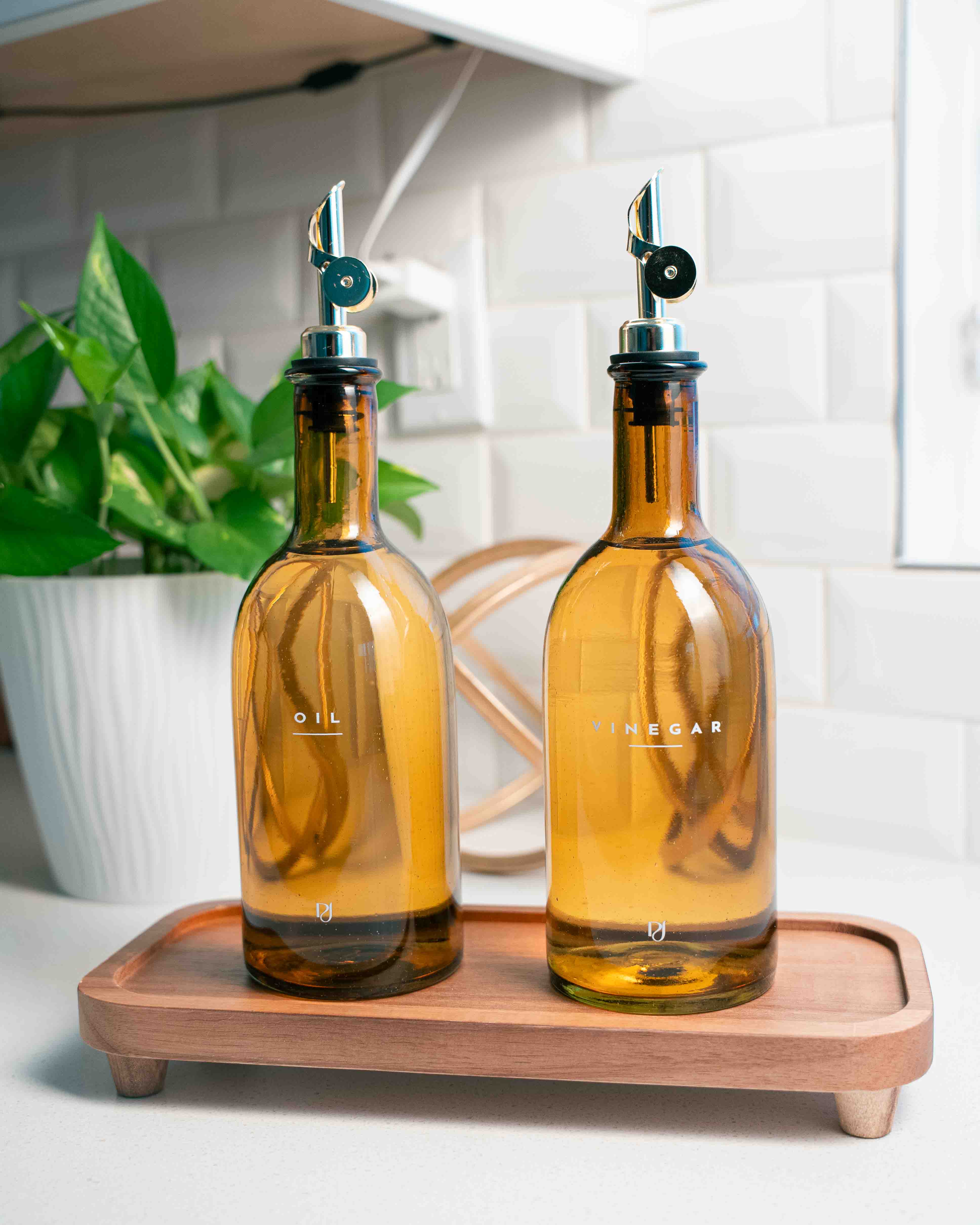 oil and vinegar with wood tray