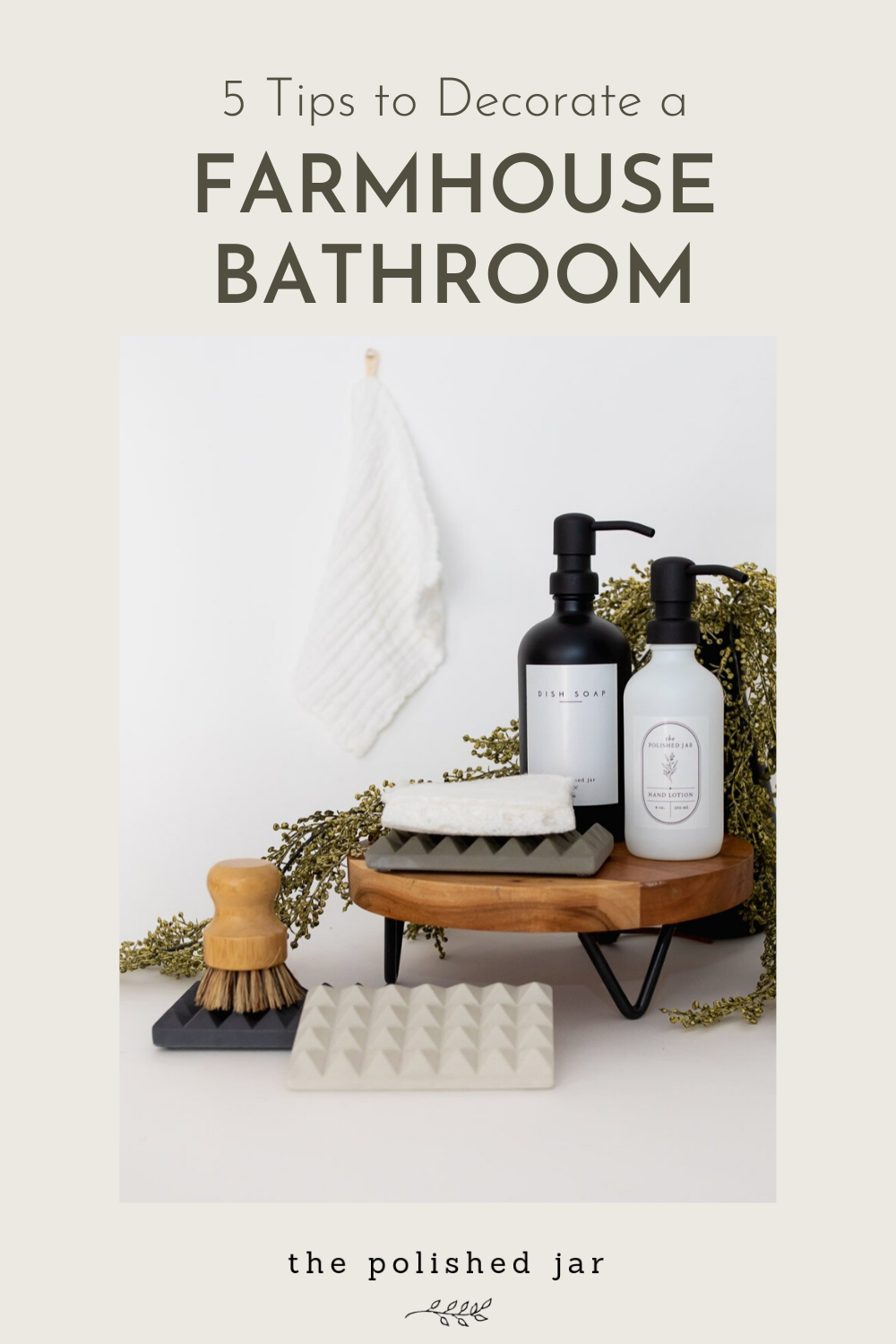 The Polished Jar Glass Bottle Soap Dispensers and Concrete Soap Tray on a Farmhouse Styled Bathroom
