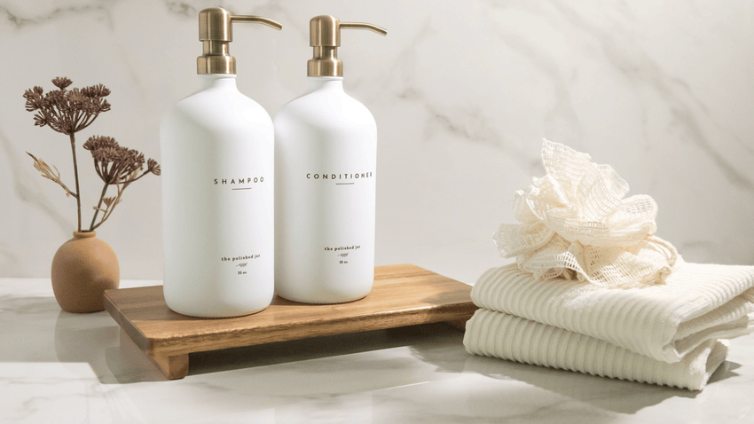 Organized bathroom counter with soap dispensers and decor