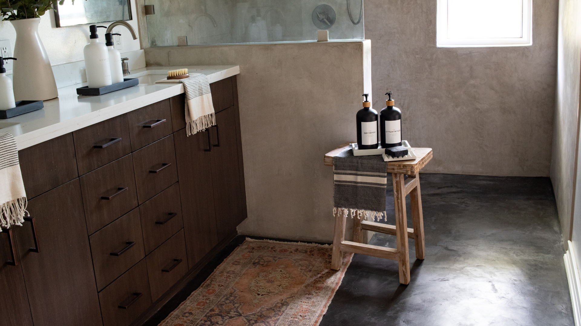 The Polished Jar Soap Dispensers and Hand Towel on Bathroom Bench