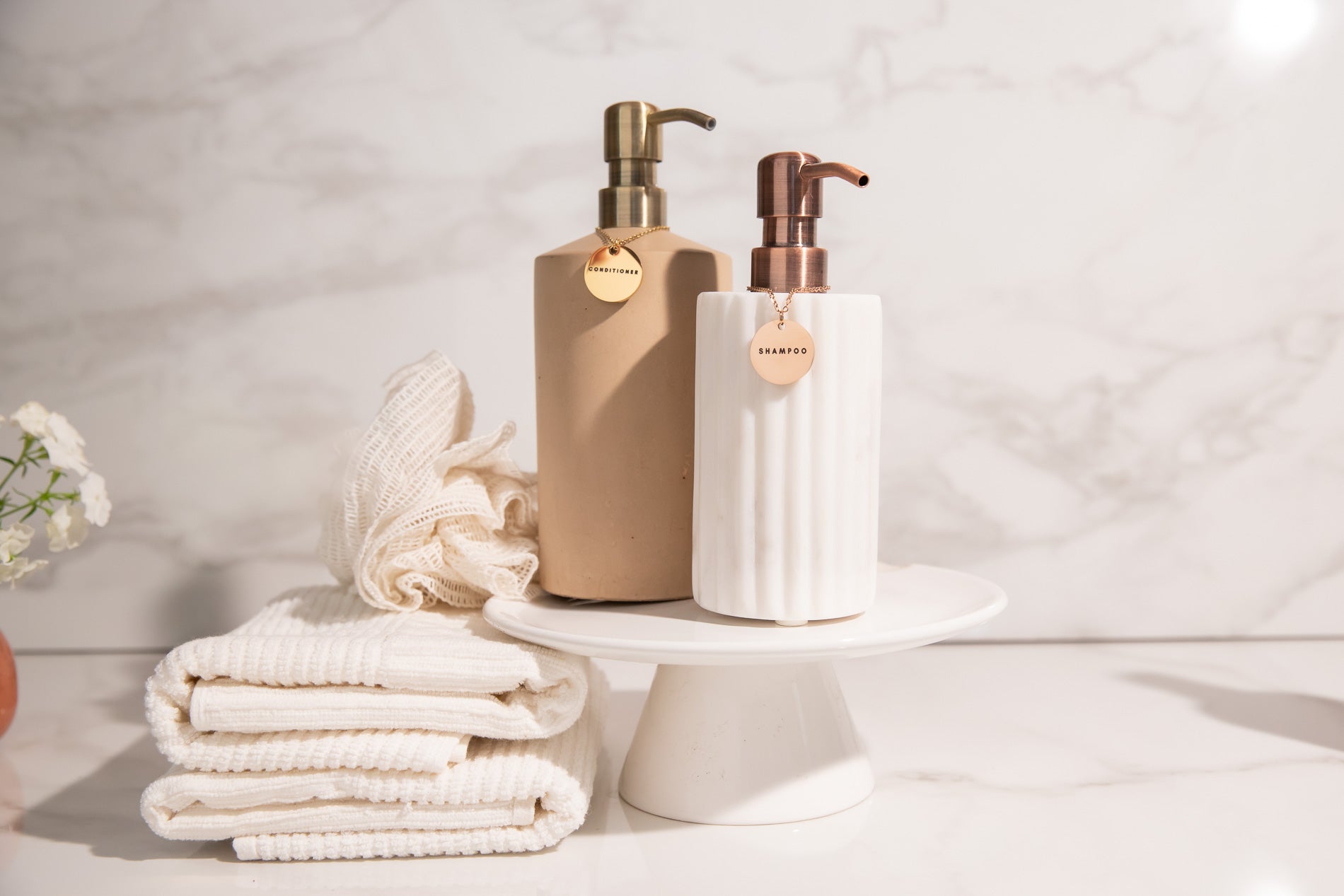 a couple of bottles sitting on top of a white table