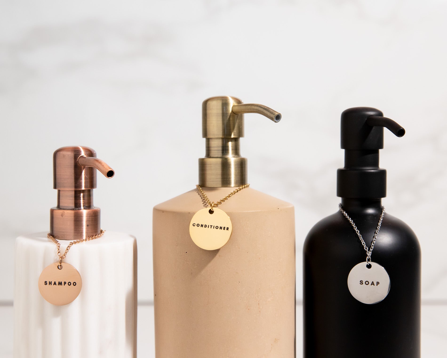 a couple of concrete bottles that are next to each other